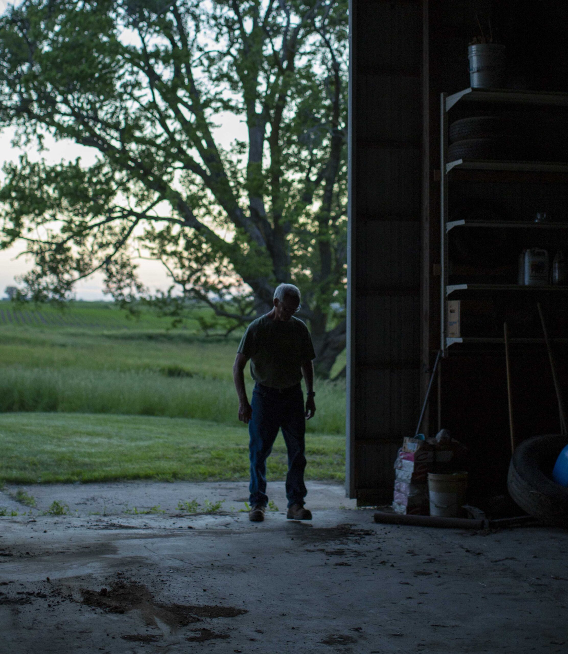 Farmer walking in a building